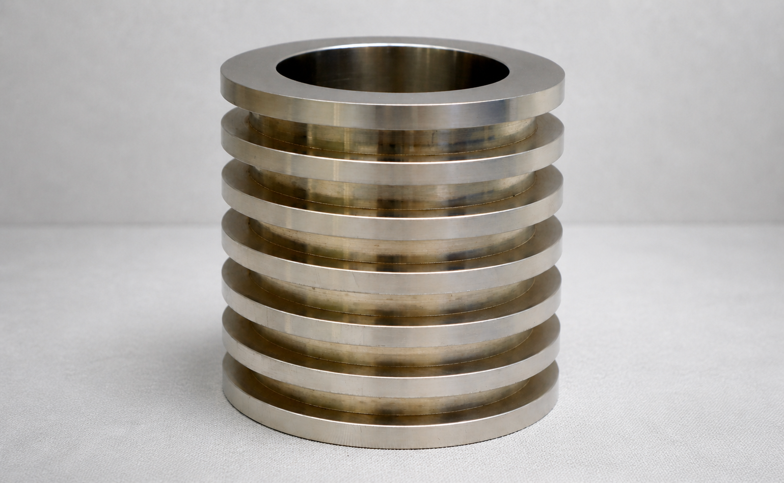 Precision CNC turned component with multiple grooves made from stainless steel
